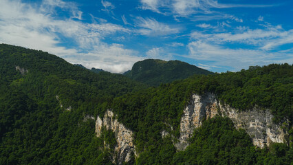 Zhangjiajie national forest park, China, Glass bridge of Zhangjiajie China Tianzishan with blue sky, concept of world heritage, avatar, heritage peak or cliff mountain, tourist attraction famous place