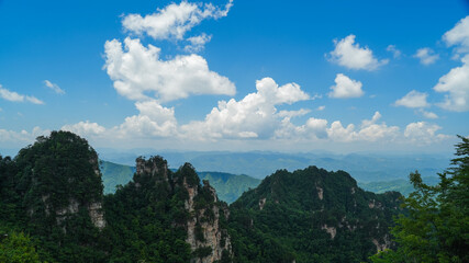 Zhangjiajie national forest park, China, Glass bridge of Zhangjiajie China Tianzishan with blue sky, concept of world heritage, avatar, heritage peak or cliff mountain, tourist attraction famous place