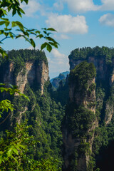 Zhangjiajie national forest park, China, Glass bridge of Zhangjiajie China Tianzishan with blue sky, concept of world heritage, avatar, heritage peak or cliff mountain, tourist attraction famous place