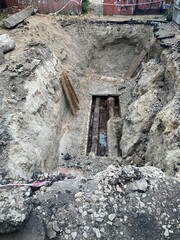 Excavated pit repair of water pipes