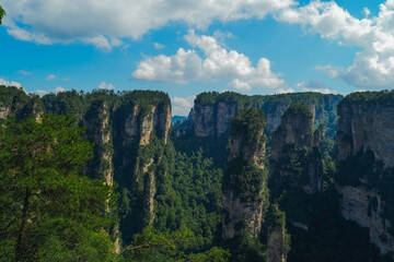 Zhangjiajie national forest park, China, Glass bridge of Zhangjiajie China Tianzishan with blue sky, concept of world heritage, avatar, heritage peak or cliff mountain, tourist attraction famous place
