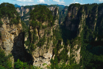 Zhangjiajie national forest park, China, Glass bridge of Zhangjiajie China Tianzishan with blue sky, concept of world heritage, avatar, heritage peak or cliff mountain, tourist attraction famous place