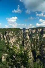 Zhangjiajie national forest park, China, Glass bridge of Zhangjiajie China Tianzishan with blue sky, concept of world heritage, avatar, heritage peak or cliff mountain, tourist attraction famous place
