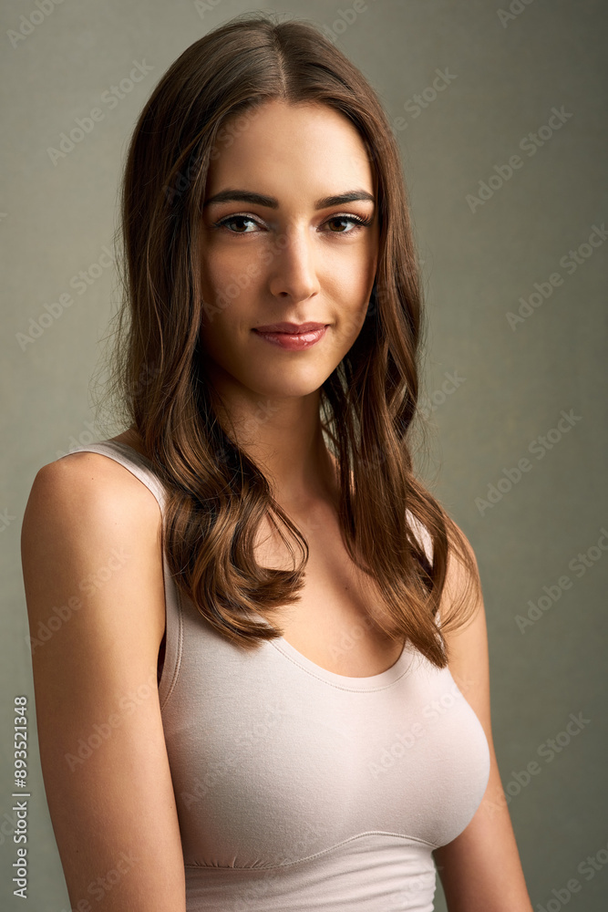 Canvas Prints Hair care, portrait and woman in studio with cosmetics for keratin treatment, shampoo or shine on gray background. Beauty, aesthetic and female model for natural glow, satisfaction or healthy texture