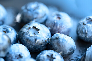 Several wet blueberries close-up, macro.