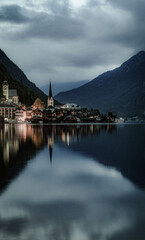 Fototapeta premium Sunrise with reflections on lake Hallsttat, Austria