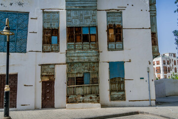 The colorful vintage wooden windows and doorsin historic Al-Balad distrinct in Jeddah, Saudi Arabia, a beautiful architecture style.
