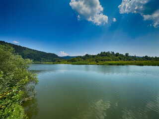 Obraz premium The landscape of Carpathian Mountains in the cloudy weather. Perfect weather condition in the summer season