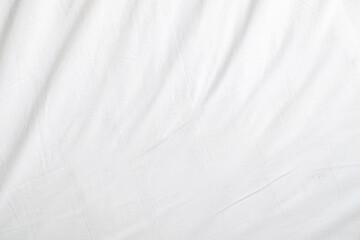 Obraz premium Abstract White Bedding Sheets or White wrinkled fabric background texture and Texture with copy-space :Creased or wrinkled white fabric,Soft focus