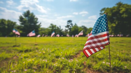 American flags wave gently, honoring the brave souls who sacrificed for our freedom this Memorial Day.