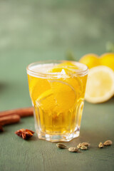 Boozy Refresing Cold Lemon Deer or Radler in a Pint Glass  on wooden table. Copy space