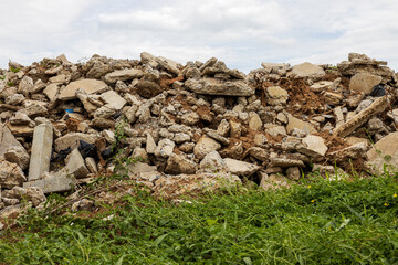 A low angle view of the many concrete ruins that have been demolished.