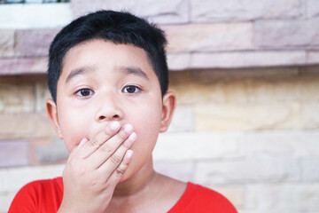 Asian boy 7 year old lost a tooth