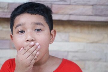 Asian boy 7 year old lost a tooth