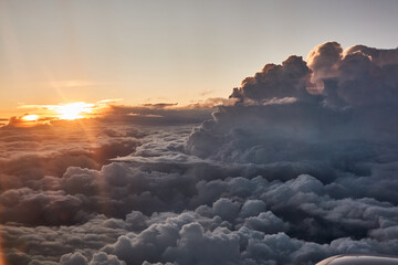 Views of clouds and clearings from a plane Madrid - Paris