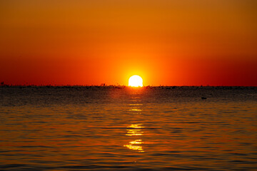 Beautiful sunrise over the morning sea.