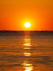 Beautiful sunrise over the morning sea.