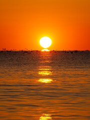 Beautiful sunrise over the morning sea.