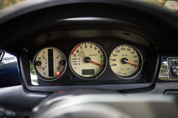 Car steering wheel and car sensors, inerior background, modern city car elements close view. Car inside interior