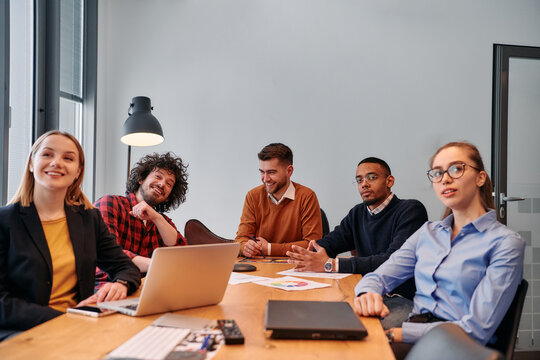 Dynamic Entrepreneurial Team Strategizing Projects in Modern Office Meeting. - Powered by Adobe