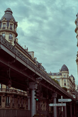 Fototapeta premium Sightseeing in Paris through Montmartre, the Latin Quarter, Notre Dame, the Eiffel Tower, the Champs Elysées, the Louvre Museum and the streets with ancient buildings, in the year of the Olympic Games