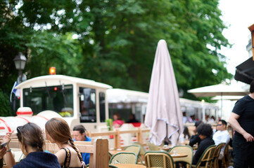 Sightseeing in Paris through Montmartre, the Latin Quarter, Notre Dame, the Eiffel Tower, the Champs Elysées, the Louvre Museum and the streets with ancient buildings, in the year of the Olympic Games