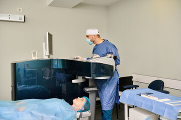 A man in scrubs attentively cares for a patient in a hospital bed.