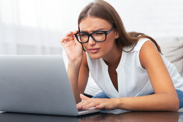 Poor Eyesight. Girl Looking At Laptop Having Near Vision Problem At Home. Selective Focus