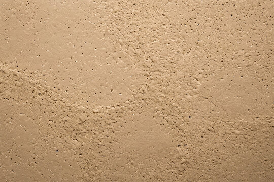 Texture enduit de fa&ccedil;ade cr&eacute;pi, tadelakt brun avec superficie utilisable pour conception ajust&eacute;e