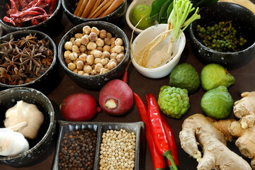 Top view shot Spices and herbs. Thai and Chinese herbs in bowl .  Colorful Thai spices in small bowls.