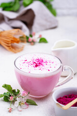 Pink matcha latte with milk