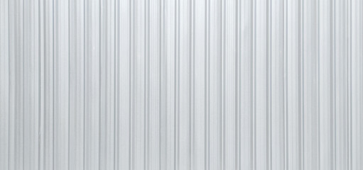 Metal aluminum silver corrugated stripe sheet wall background with texture vertical lines