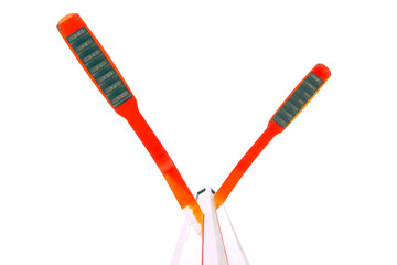 Two bright red street lights positioned in an inverted ‘V’ shape, high key.