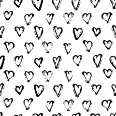 Ornament for Valentine's day. Seamless pattern with doodle hearts. Ink illustration.