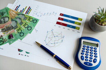 documents about the marketing plan and sales report finance pen calculator aud australian dollar