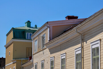 Low angle view of buildings against blue sky