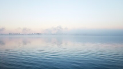 Obraz premium Early Morning Fog Over a Still Lake