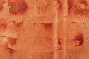 Texture and abstract background empty plain and old stained wiped copper colours.