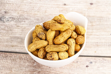 Raw ripe unpeeled peanut heap