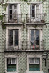 Grungy classic portuguese tile facade in green in Lisbon