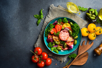 Fresh vegetable summer colorful salad. Vegetarian food. Top view.