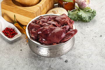 Raw uncooked chicken liver in the bowl