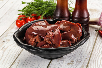 Raw chicken liver uncooked in the bowl