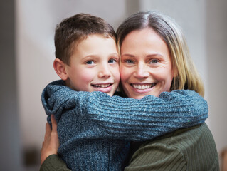 Smile, hug and portrait of mom with child in home together for support, growth and development. Love, embrace and happy face of proud mother with son for care, trust and family bonding in apartment.