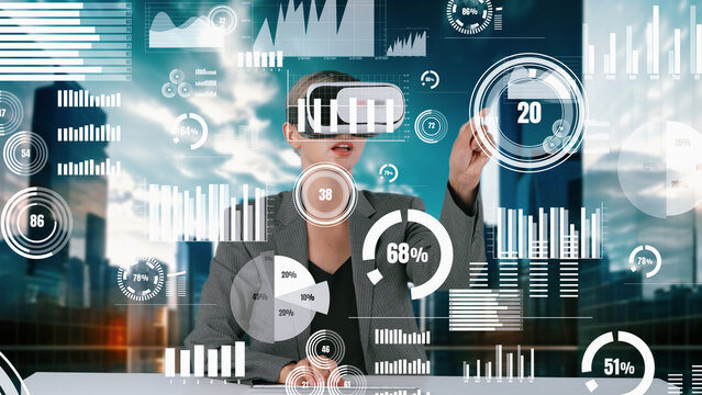 Woman typing on keyboard selecting dynamic market data analysis monitor by VR global innovation interface digital infographic network technology virtual hologram animation on building bg. Contraption.