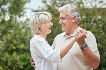 Outdoor, love and senior couple with dancing for anniversary, celebration and care in marriage. Married people, man and woman with happiness for hug, connection and bonding with romance in retirement - Powered by Adobe