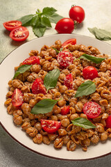 Tuscan pasta with smoked paprika and basil,parmesan cheese, Italian traditional cuisine,