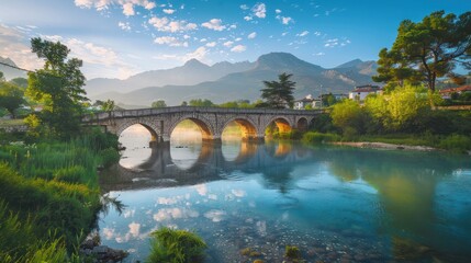 Fototapeta premium stunning spring view of old mes bridge gorgeous morning landscape of shkoder colorful outdoor scene of albania europe traveling concept background