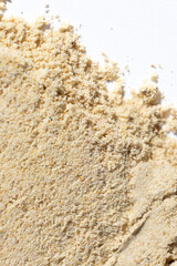 Abstract beige ground ginger background. Creativity in cooking.