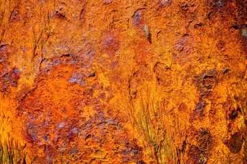 Rusty background. Multilayer rust. Metal structure at sea.